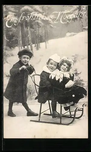 AK Kinder auf Schlitten werden angeschoben, Neujahrsgruss