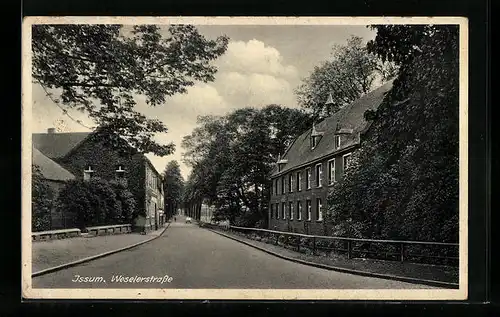AK Issum, Weselerstrasse mit Häusern