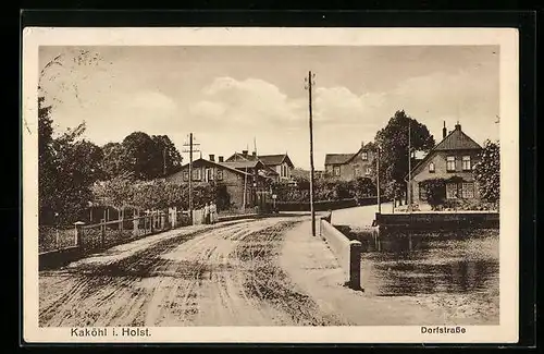 AK Kaköhl i. Holst., Dorfstrasse mit Häusern