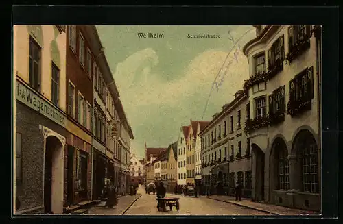 AK Weilheim, Schmiedstrasse mit Passanten
