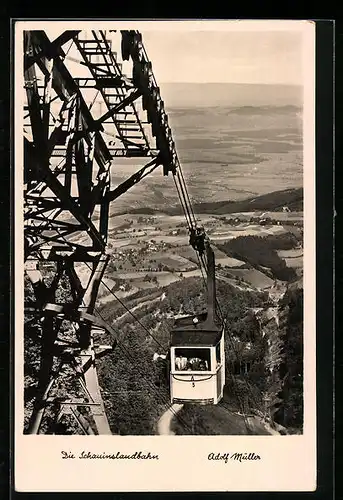 AK Freiburg i. Br., Kabine der Schauinslandbahn über der Landschaft
