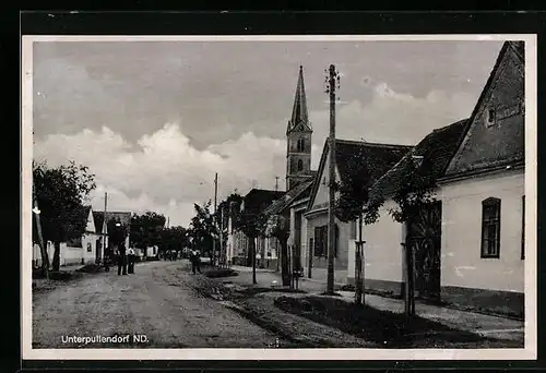 AK Unterpullendorf, Strassenpartie mit Kirche
