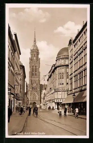 AK Krefeld, Strasse mit Geschäften