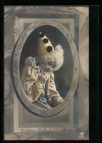 AK Lächelnde Harlekindame in Gelb