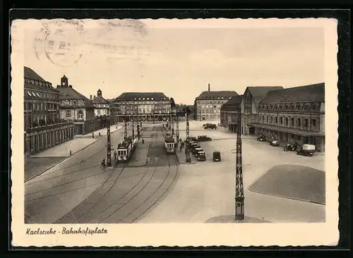 AK Karlsruhe, Bahnhofsplatz mit Strassenbahnen