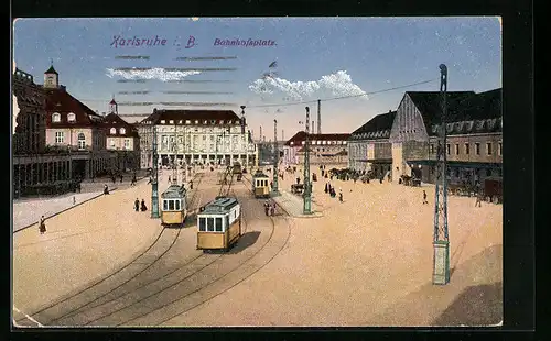AK Karlsruhe i. B., Bahnhof mit Bahnhofsplatz und Strassenbahnen