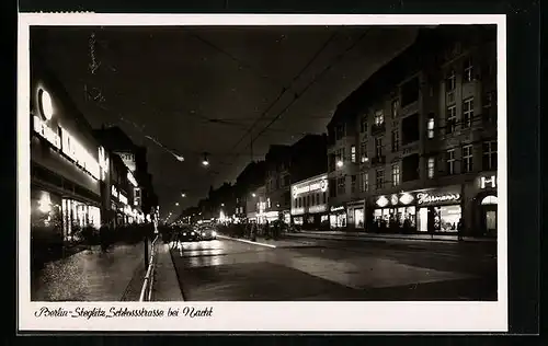 AK Berlin-Steglitz, Schlossstrasse bei Nacht