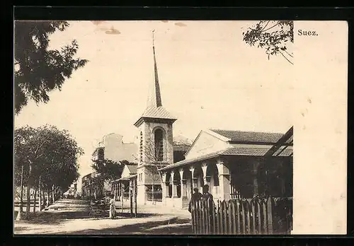AK Suez, Strassenpartie mit Kirche