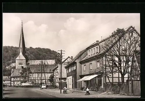 AK Niedersachswerfen /Südharz, Rudolf-Breitscheid-Strasse mit Geschäft und Kirche