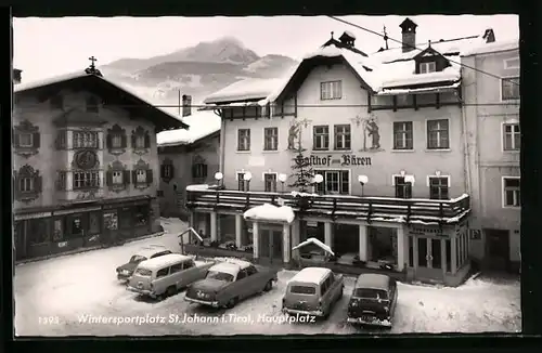 AK St. Johann i. T., Hauptplatz mit Gasthof zum Bären im Winter