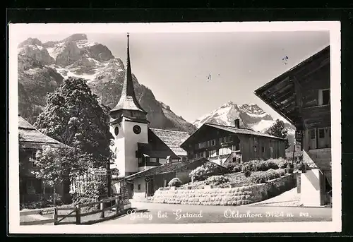 AK Gsteig bei Gstaad, Ortspartie mit Kirche und Oldenhorn