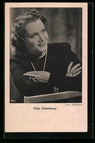 AK Schauspielerin Olga Tschechowa freundlich lächelnd mit Schmuck