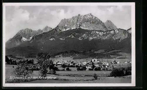 AK St. Johann i. T., Ortsansicht mit dem Kaisergebirge