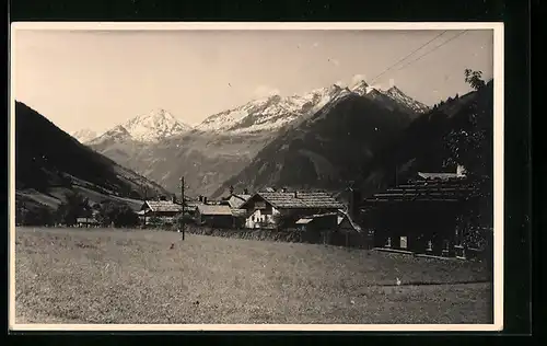 AK Rauris, Ortspartie mit Bergen