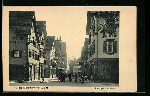 AK Freudenstadt, Stuttgarterstrasse mit Passanten und Ochsenwagen