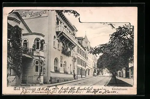 AK Bad Pyrmont, Partie in der Kirchstrasse mit Hotel Rasmusssen