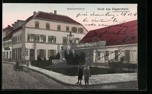 AK Oggersheim, Strassenpartie mit Schiller-Drogerie und Schillerdenkmal