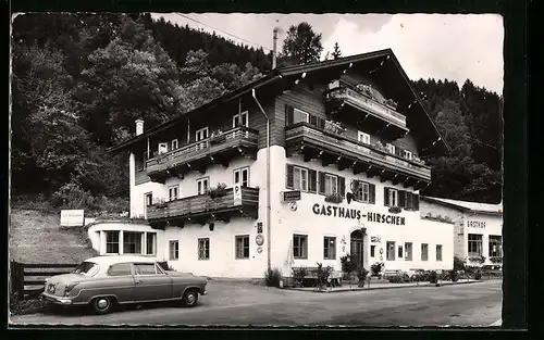 AK Bruck a. d. Glocknerstrasse, Gasthaus Hirschen mit Auto