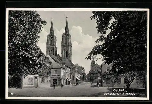 AK Oschatz, Altoschatzer Strasse mit Kirche