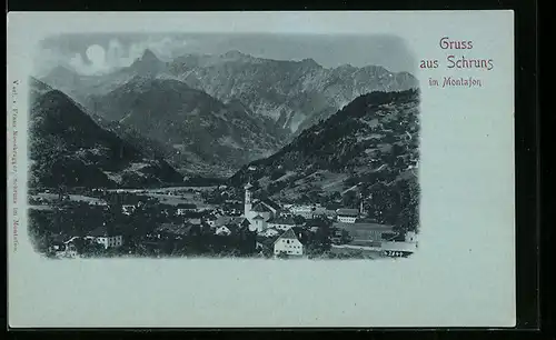 Mondschein-AK Schruns im Montafon, Ortsansicht mit Bergkulisse