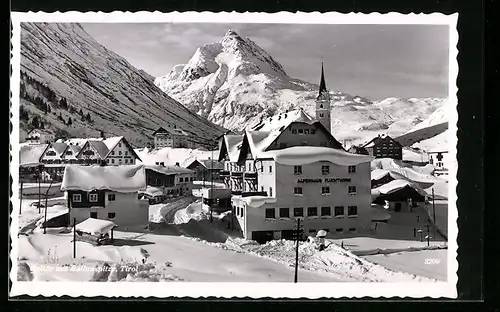 AK Galtür, Ortsansicht mit Ballunspitze im Winter