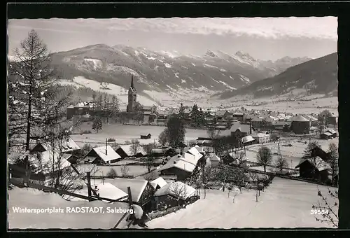 AK Radstadt, Teilansicht mit Kirche im Schnee