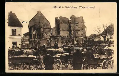AK Ortelsburg /Ostpreussen, Markt mit zerstörtem Gebäude