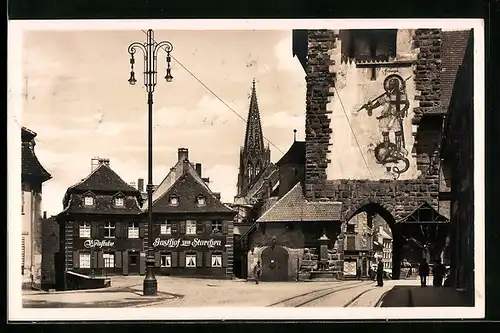 AK Freiburg /Breisgau, Am Schwabentor mit Gasthof zum Storchen