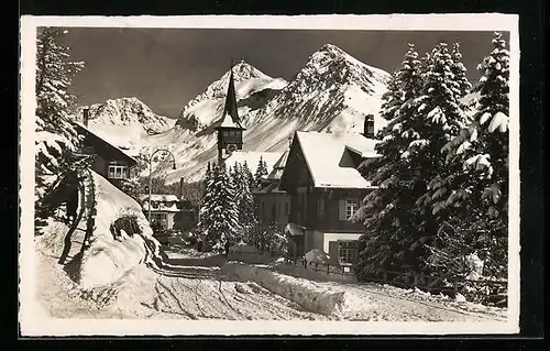 AK Arosa, Dorfkirche im Schneekleid