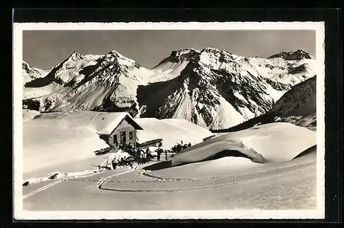 AK Arosa, Carmenna Hütte mit Furka im Winter