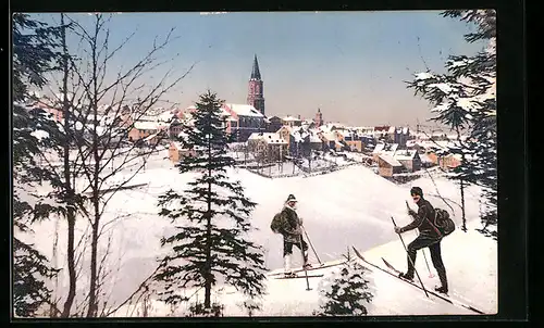 AK Johanngeorgenstadt i. Erzgeb., Totale mit Skiläufern im Winter
