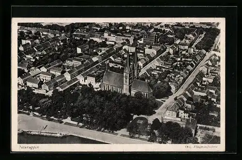 AK Neuruppin, Fliegeraufnahme der Kirche und Blick auf die Stadt