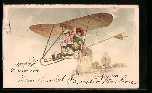 Künstler-AK Kinder im frühen Flugzeug, Neujahrsgruss