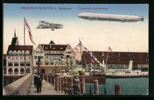 AK Friedrichshafen, Flugzeug und Zeppelin über dem Dampfschiffahrtshafen