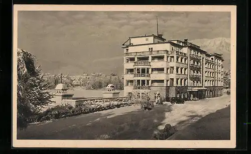 AK Veldes, Grand-Hotel mit Strasse im Winter