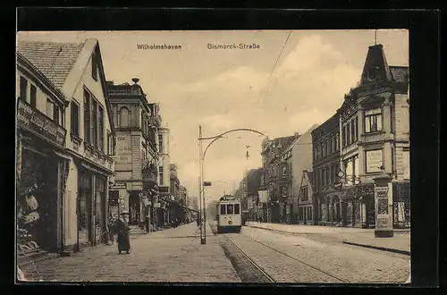 AK Wilhelmshaven, Bismarck-Strasse mit Geschäften und Strassenbahn