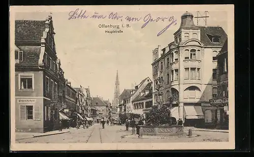 AK Offenburg i. B., Hauptstrasse mit Brunnen und Kirche