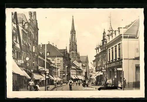 AK Offenburg, Strassenpartie mit Hotel Rheinischer Hof und Kirche