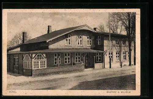 AK Süsel, Gasthof A. Wilhelm mit Strasse