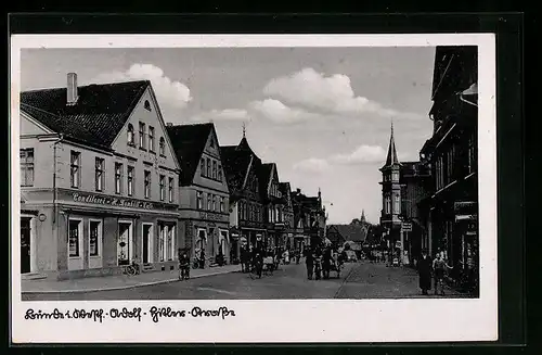 AK Bünde i. Westf., Blick in die Strasse mit Häusern