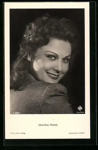 AK Schauspielerin Marika Rökk blickt über ihre Schulter