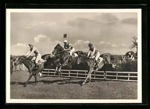 AK Springreiter beim Setzen über eine Hürde