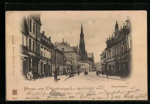 AK Offenburg, Hauptstrasse mit Geschäften und Kirche