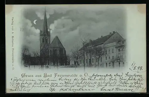 Mondschein-AK Bad Freienwalde a. O., Ortspartie mit Kirche