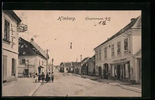 AK Himberg, Hauptstrasse mit Geschäft von Ludwig Erber