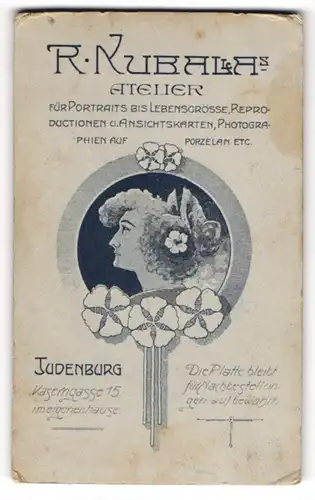 Fotografie R. Nubala, Judenburg, Kaserngasse 15, Frauenkopf im Seitenprofil mit Blumen im Haar, Jugendstil