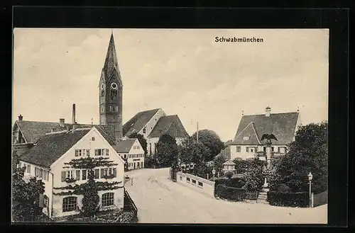 AK Schwabmünchen, Strassenpartie mit Kirche und Denkmal