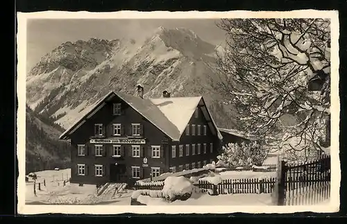AK Mittelberg, Gasthaus Widderstein im Winter mit schneebedecktem Umland
