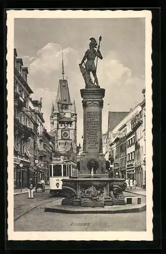 AK Freiburg i. Br., Martinstor und Bertholdsbrunnen mit Strassenbahn