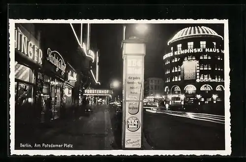 AK Berlin-Tiergarten, Potsdamer Platz bei Nacht mit Kempinski Haus